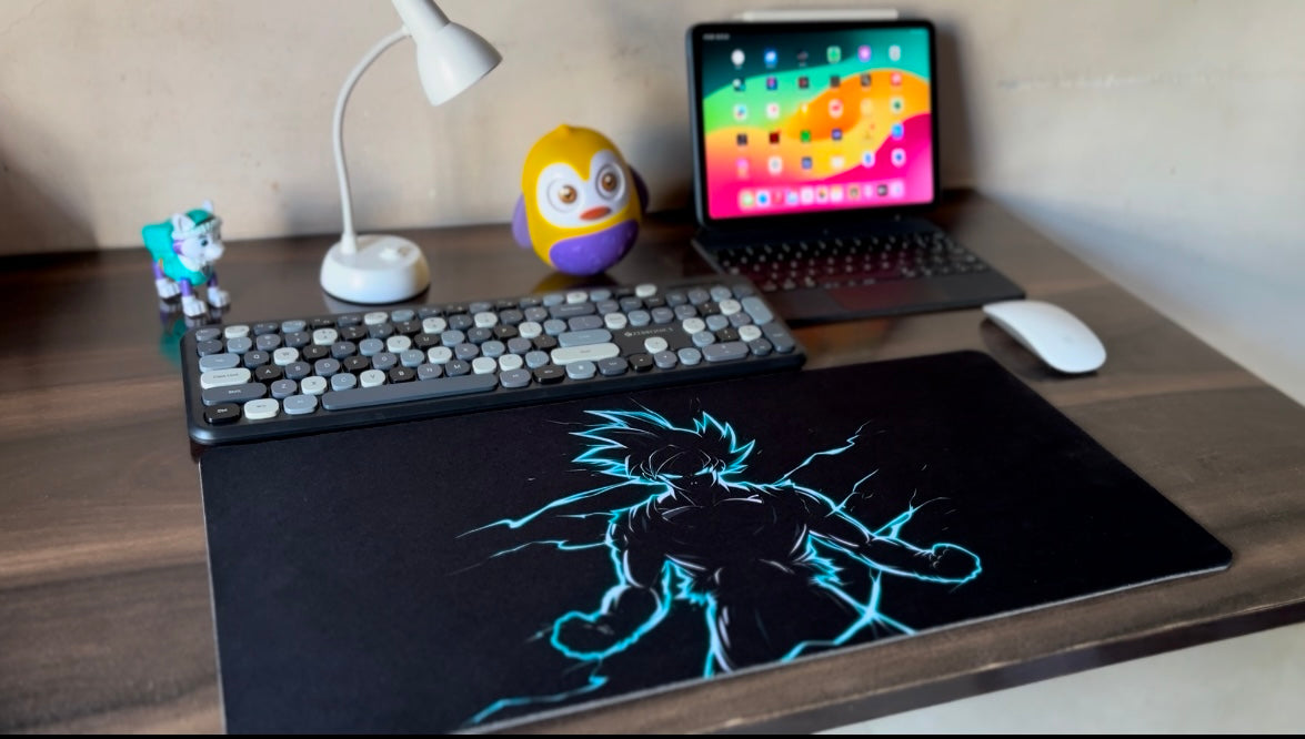 Goku Desk Mat - Power Up Your Workspace Elevate your setup with this premium desk mat featuring Goku in full power mode. With a smooth surface, anti-slip base, and vibrant, fade-resistant design, it’s perfect for work, gaming, or anime fans!