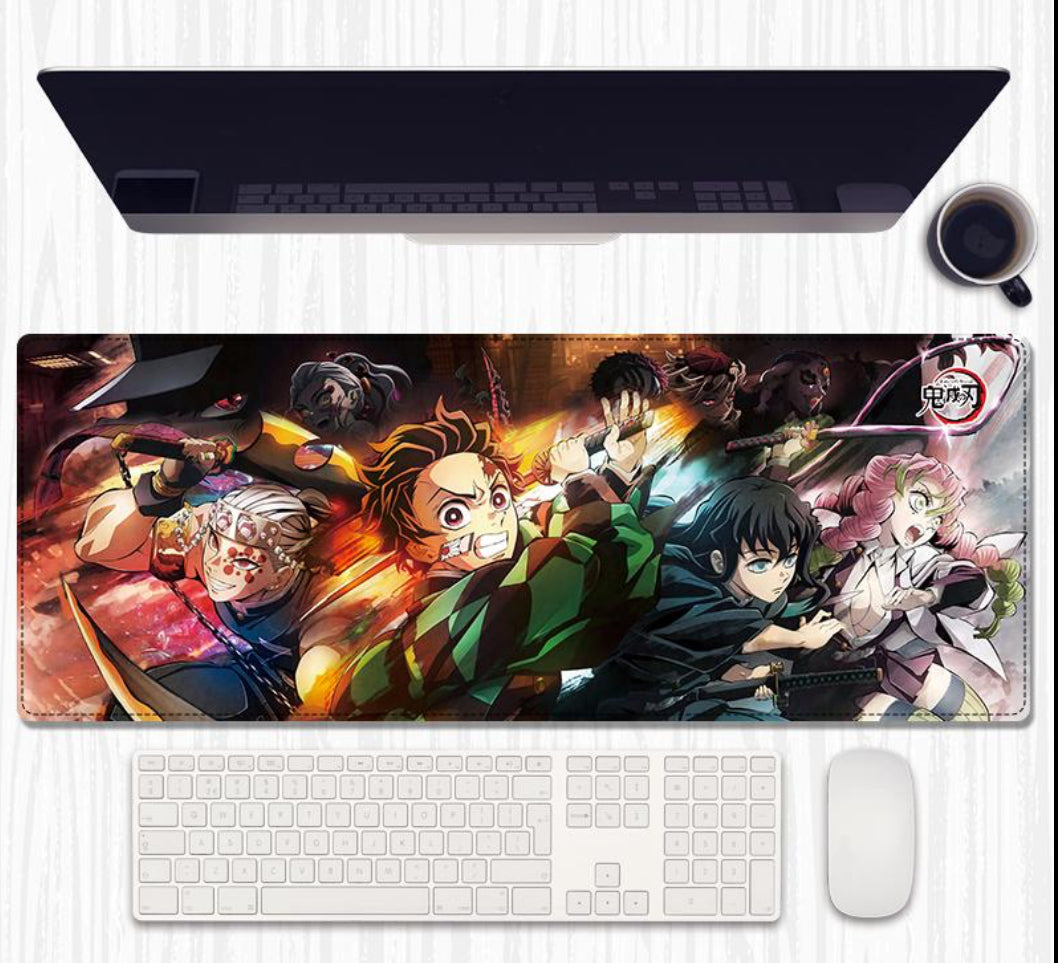 Demon Slayer - “Slice through distractions with the fiery determination of the Demon Slayer Corps – the ultimate desk mat for every fan!”