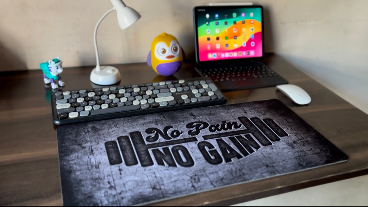 No Pain No Gain Desk Mat Stay motivated with the No Pain No Gain desk mat! Featuring a bold design, durable anti-slip base, and smooth surface for precision, it’s the perfect addition to fuel your focus and productivity.